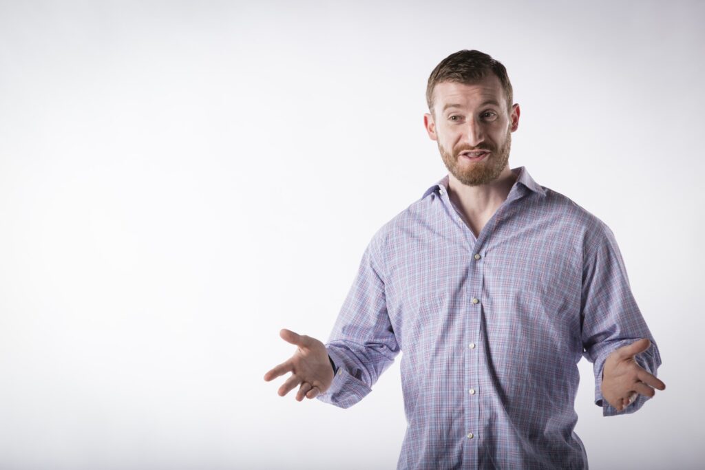 Stephen Lambdin gesturing while speaking